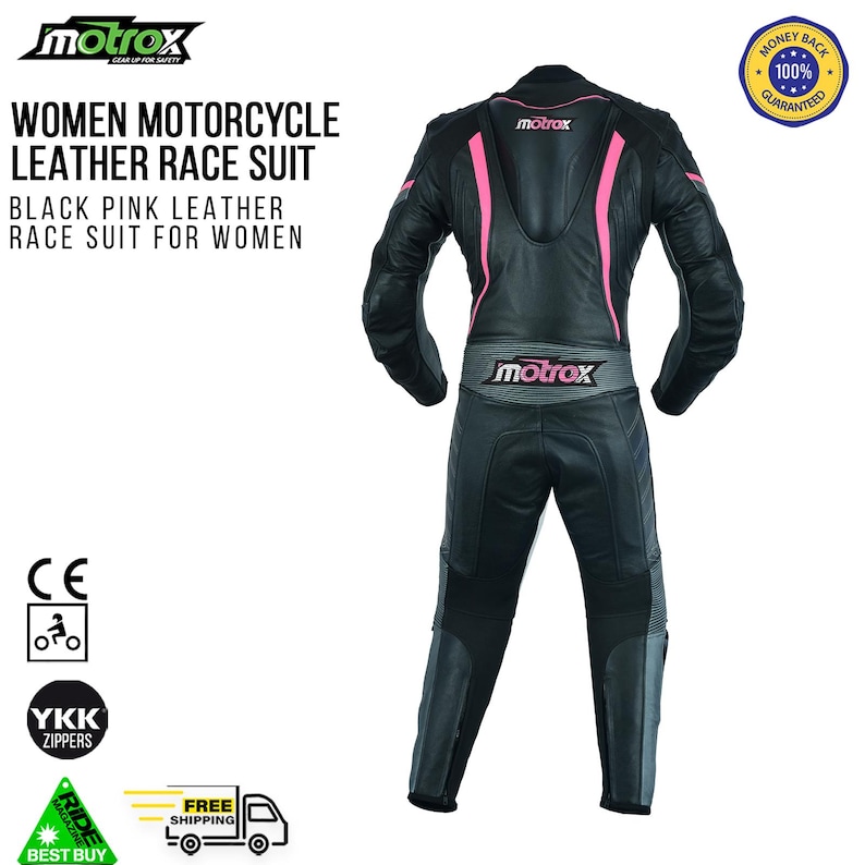 May include: Black and pink leather motorcycle race suit. The suit has a black base with pink accents and the word "motrox" printed on the back.