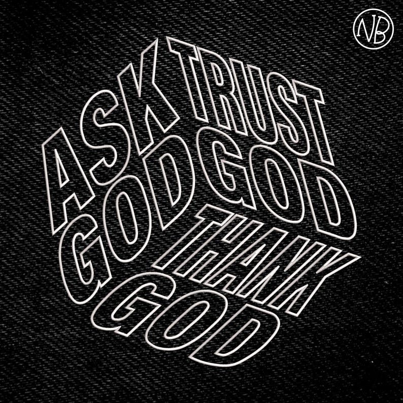 May include: Black denim fabric with the white text "ASK GOD TRUST GOD THANK GOD" in a stylized, layered font. The letters are outlined, creating a 3D effect. A circular "NB" logo is in the top right corner.