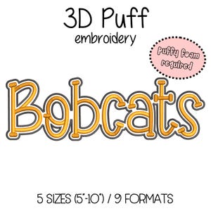 May include: A gold-colored "Bobcats" embroidery design with a black outline, featuring 3D puff embroidery. The design is accompanied by text indicating "Puffy Foam required" and available in 5 sizes, ranging from 5 to 10 inches, and 9 formats.