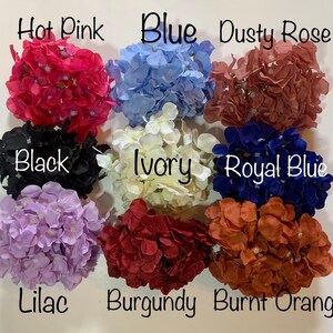 May include: Assortment of 10 faux hydrangea flower heads in various colors, including hot pink, blue, dusty rose, black, ivory, royal blue, lilac, burgundy, and burnt orange.