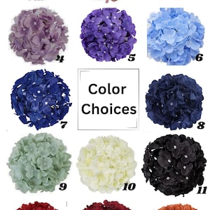 May include: A selection of 14 different colors of artificial hydrangea flower heads. The colors include pink, red, purple, blue, white, green, black, and brown.