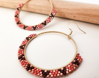 Golden hoop earrings made from miyuki beads