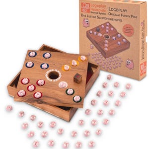 May include: A Logoplay Original Funny Pigz board game set featuring a square wooden board with circular indentations, a wooden die, and numerous small pink pig figurines. The cardboard packaging displays the game title and illustrations.