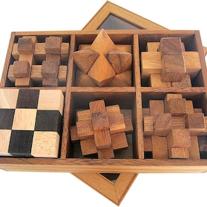 6 giochi di puzzle in un set in una scatola regalo di legno con coperchio trasparente