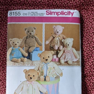 May include: Simplicity sewing pattern number 8155, one size, for making teddy bears. The pattern includes instructions for making six different teddy bears, each with a different outfit. The pattern is designed and printed in the USA.