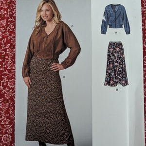 May include: A sewing pattern for a brown and white patterned skirt and a brown suede top. The pattern is from New Look and is size 8-18, 36-48, 34-46. The pattern number is N6710.