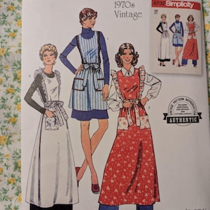 May include: Vintage Simplicity sewing pattern for three different apron styles. The pattern is for sizes S-L and includes instructions for making the aprons. The pattern is labeled "1970s Vintage" and "Easy-to-sew".