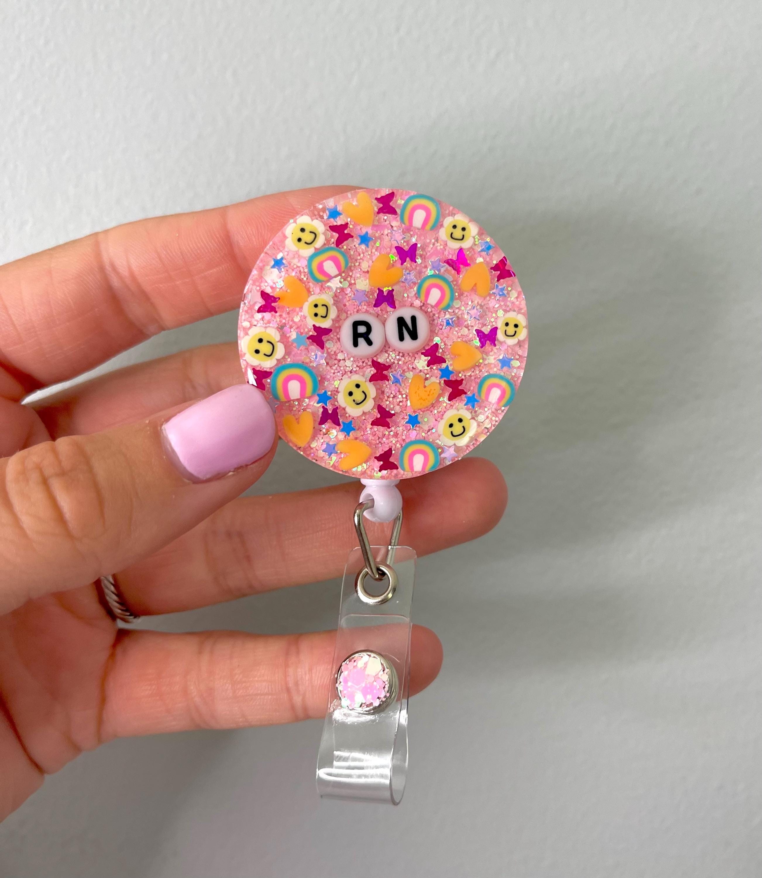 Smiley Flower Badge Reel
