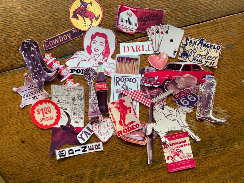 May include: A collection of vintage paper ephemera with a western theme. The ephemera includes images of cowboys, horses, a rodeo, a diner, a sheriff's star, a map, a pack of cigarettes, a matchbook, a car, and a heart. The text on the ephemera includes "Cowboy Wo", "$100 Special", "Marlbory", "DARLL", "POIS", "RODEO", "YAL", "WELCOME", "DINER", "SAN ANGELO STOCK SHOW RODEO MAR. 7-11", "ROUTE 66", and "WESTMOOR COURTS".