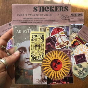 May include: A pack of 10 vintage witchy stickers featuring a variety of designs, including a moon face, a sun face, a mushroom, and a Zolar Speaks sign. The stickers are printed on high-quality splash-proof glossy paper.