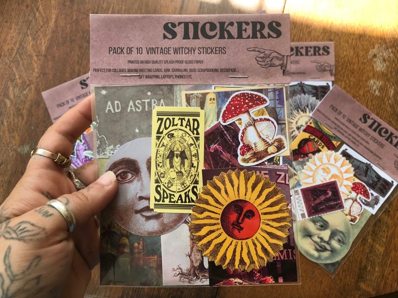 May include: A pack of 10 vintage witchy stickers featuring a variety of designs, including a moon face, a sun face, a mushroom, and a Zolar Speaks sign. The stickers are printed on high-quality splash-proof glossy paper.