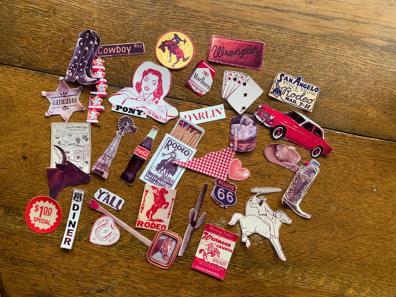 May include: A collection of vintage-style stickers with a Western theme. The stickers feature images of cowboys, horses, boots, and other Western imagery. The stickers are printed on white paper with red, blue, and yellow accents. The text on the stickers includes "Cowboy Way", "Wrangler", "San Angelo Stock Show Rodeo", "Darlin", "Route 66", "Y'all", "Rodeo", and "Westmoor Courts".