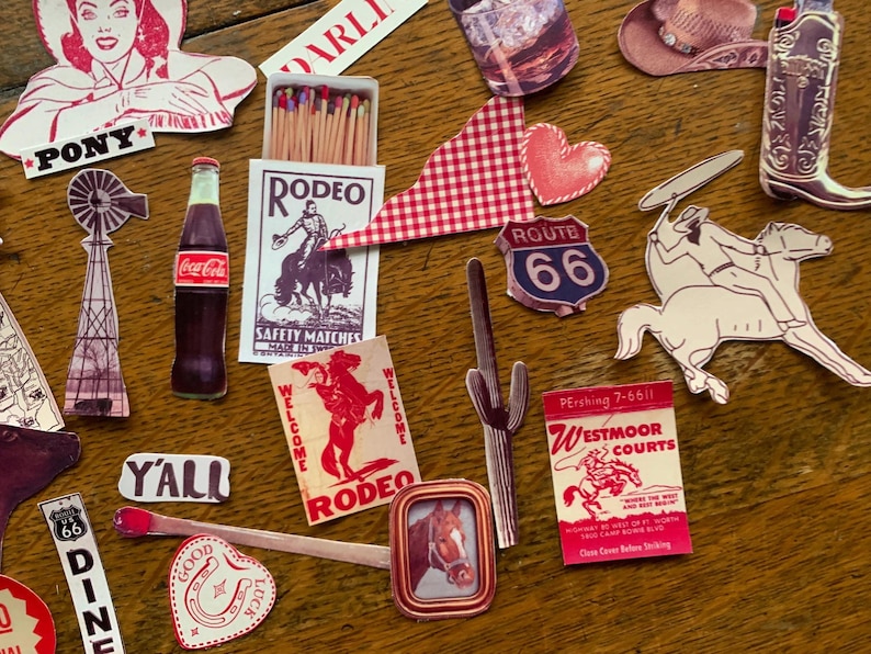 May include: A collection of vintage Western-themed paper ephemera, including a red and white gingham flag, a red heart, a matchbook with the word "RODEO" printed on it, a Coca-Cola bottle, a sign that says "ROUTE 66", and a sign that says "WESTMOOR COURTS".