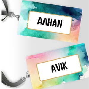May include: Two colorful watercolor name tags with gold trim. The top tag says "AAHAN" and the bottom tag says "AVIK".