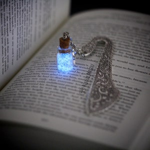 Glowing Bookmark Glow in the Dark and Glitter Bottle on Metal Silver Glow in the Dark Fairydust Bookmark celestial stars Gift Light