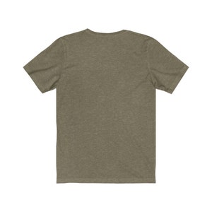 May include: A plain, short-sleeved t-shirt in a dark green heather color.