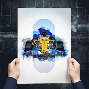 May include: A watercolor painting of a Formula 1 race car in blue, yellow, and black with the word "DAZN" on the side. The car is surrounded by blue and white watercolor splatters.