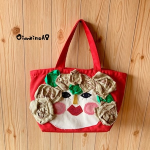 Bolso hecho a mano, collage de tela, bolso de mano colorido, una combinación de telas