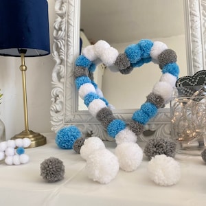 Heart Shaped PomPom Wreath. Fluffy handmade woollen Pom poms white,  blue and grey . Nursery , bedroom etc
