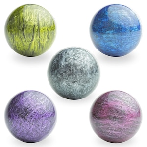 May include: Five decorative spheres with a metallic finish. The spheres are green, blue, gray, purple, and pink. Each sphere has a unique swirling pattern.