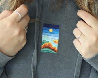 Schema per ricamo paesaggio montano: punto raso (schema PDF)