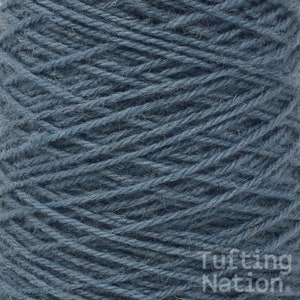 May include: A close-up of a skein of blue yarn. The yarn is made of wool and is a medium weight. It is perfect for knitting or crocheting.