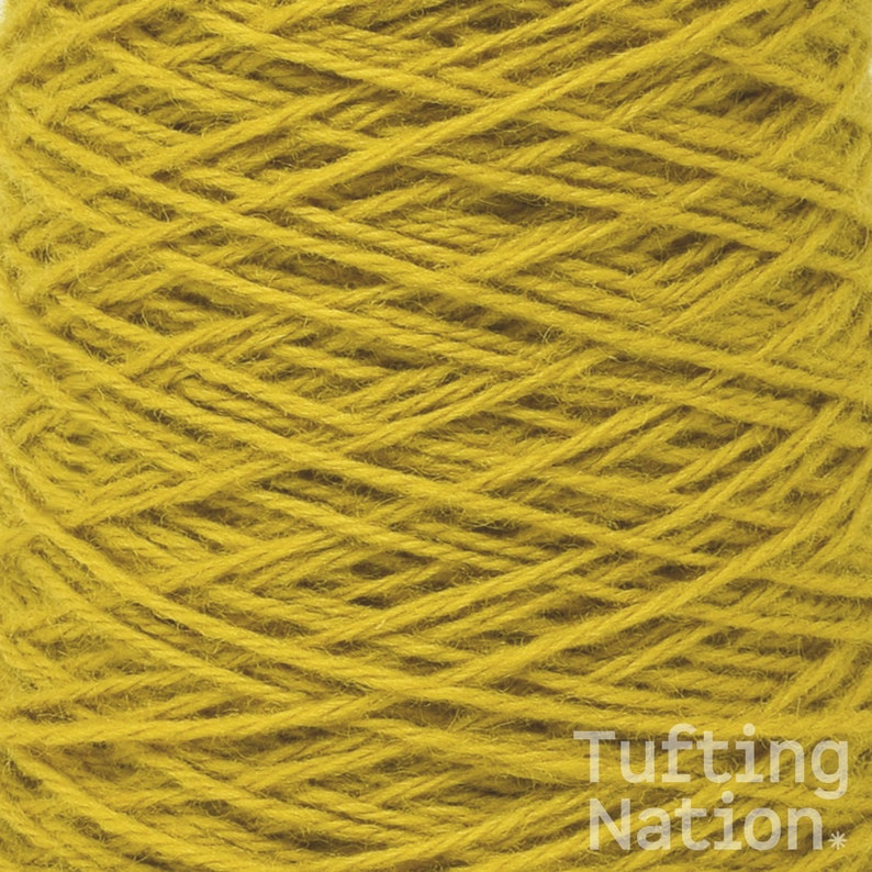May include: A close-up of a spool of yellow yarn. The yarn is tightly wound and has a soft, fuzzy texture.