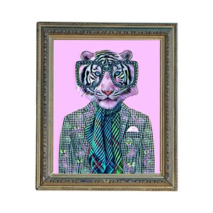 May include: A framed art print featuring a stylized tiger wearing large, jeweled glasses, a patterned suit, and a striped scarf. The background is a soft pink, and the frame is gold-toned.
