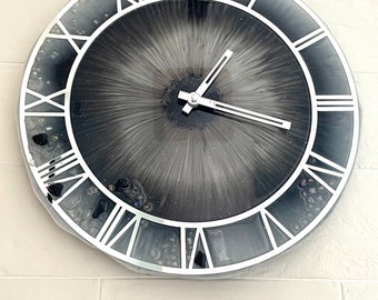 Black and white epoxy resin wall clock with silver accents