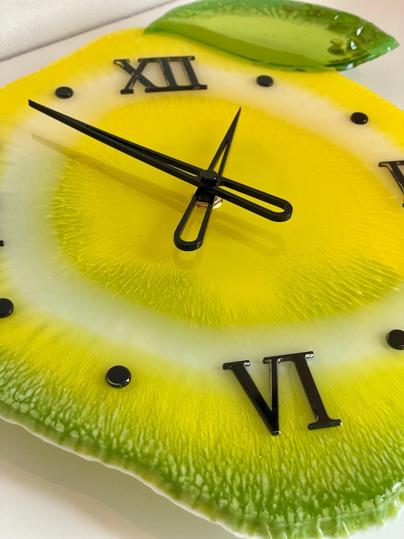 Lemon resin wall clock with black clock face