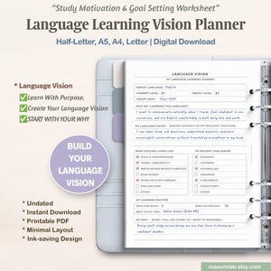 May include: A digital language learning vision planner worksheet in a light blue binder. The page includes sections for target language, current level, target date, learning routine, and checkboxes for success goals and challenges with handwritten text.