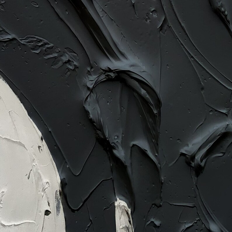 May include: Abstract painting featuring black and white paint. The black paint is thick and textured, while the white paint is smooth. The painting is abstract and modern.