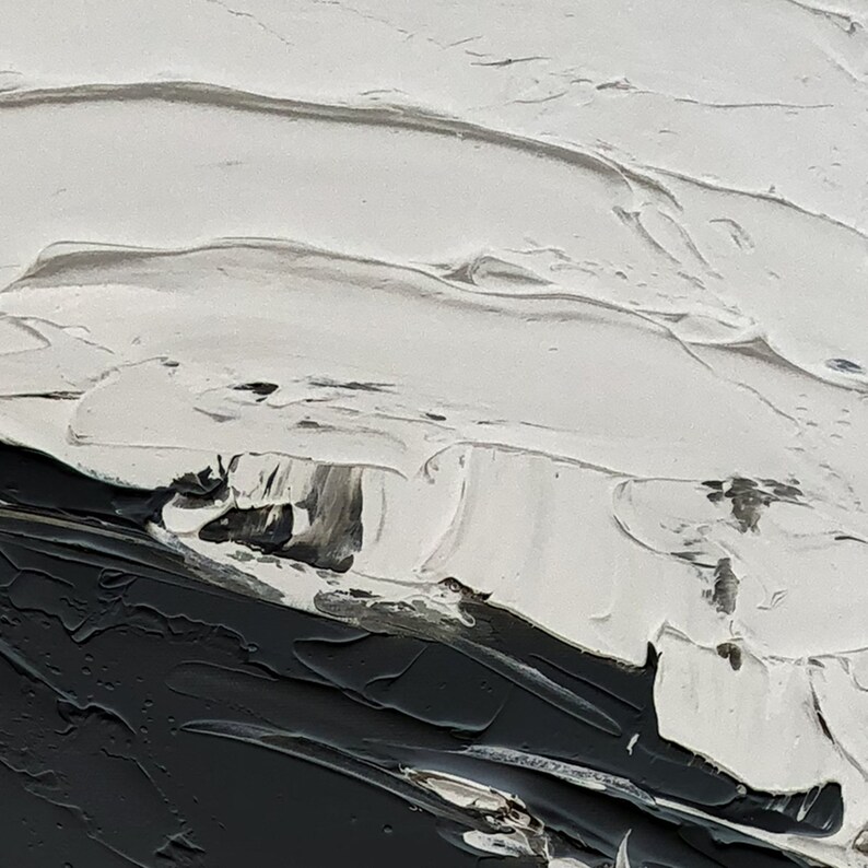 May include: Abstract painting with thick white paint strokes on a black background.