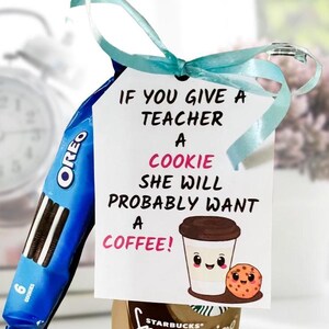 May include: A white gift tag with the text "If you give a teacher a cookie she will probably want a coffee!" with a cartoon coffee cup and cookie. A blue and white Oreo cookie package is tied to the tag with a blue ribbon.