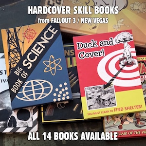 May include: A collection of hardcover skill books from Fallout 3 and New Vegas, including titles like Big Book of Science, Duck and Cover, and Wasteland Survival Guide. The covers feature graphic illustrations, bold text, and vibrant colours.
