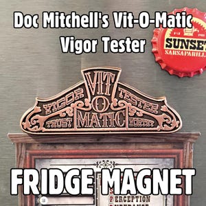 May include: A fridge magnet with the text "Doc Mitchell's Vit-O-Matic Vigor Tester" in a vintage style. The magnet has a copper-colored design with the words "Trust" and "Worth" and a red bottle cap.