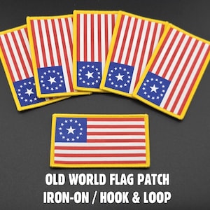 May include: Six rectangular patches featuring a historical flag design with red and white vertical stripes and a blue canton containing a circle of white stars. Each patch has a yellow border. The text OLD WORLD FLAG PATCH IRON-ON / HOOK & LOOP.