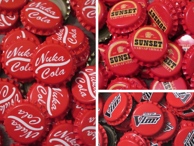 May include: A collection of red metal bottle caps featuring white printed logos. The caps display the text Nuka Cola in a cursive script, Sunset Sarsaparilla with a barrel icon, and Vim with the phrase You've got Vim! in a bold, stylized font.