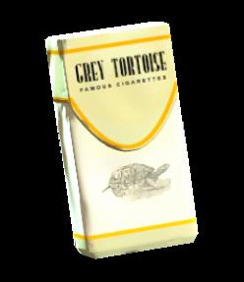 May include: A pack of "Grey Tortoise" cigarettes. The pack is primarily white with yellow and black accents. The brand name is printed in bold black letters above the words "Famous Cigarettes". A drawing of a tortoise is below the brand name.