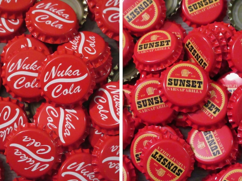 May include: A collection of red metal bottle caps featuring two distinct designs. The left side displays the white text Nuka Cola, while the right side features a yellow and black circular logo with the text Sunset Sarsaparilla and a barrel icon.