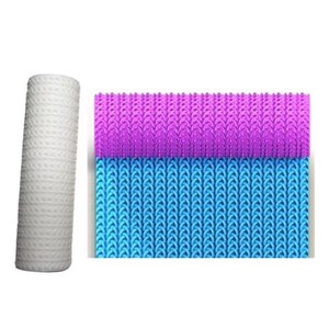May include: A white rolling pin with a textured surface and a blue and purple patterned rolling pin.
