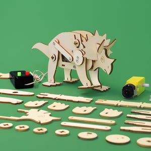 Kit de bricolaje de dinosaurio robot Triceratops: juguete educativo STEM para niños, manualidades científicas divertidas