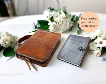May include: A brown leather journal with a zipper closure and a matching brown leather bible cover with the text "The Journey" and a decorative infinity symbol.
