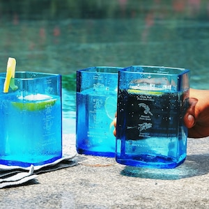 Upcycled Bombay Sapphire Gin Glass, handmade from recycled bottles, perfect for an eco-friendly gin lover's gift. Sustainable drinkware