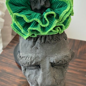 Beautiful Scrunchie , made from pleated material and beautiful neon green  cotton thread finishing
