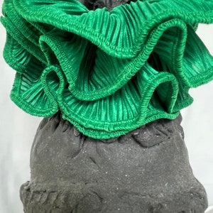 Beautiful Scrunchie , made from pleated material and beautiful green  cotton thread finishing