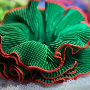 Beautiful Scrunchie , made from pleated material and beautiful neon green  cotton thread finishing