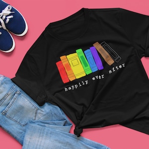 May include: Black t-shirt with a rainbow stack of books and the text "happily ever after".