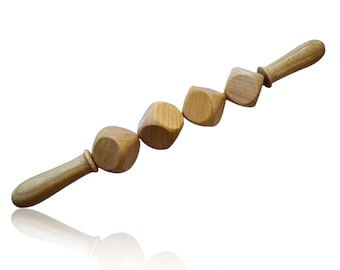 Masaje de maderoterapia con rodillo de 4 dados