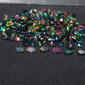 Black opal gemstone, natural black opal, black oval opal cut, Ethiopian black faceted oval opal, multi fire black opal faceted cut 6x4 mm